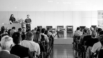 Am Symposium an der Universität Basel.